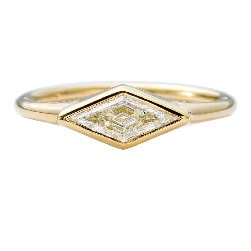 Shine Bright With Our Special Jewelry Promotions Lozenge Cut Diamond Engagement Ring with a Golden Bezel