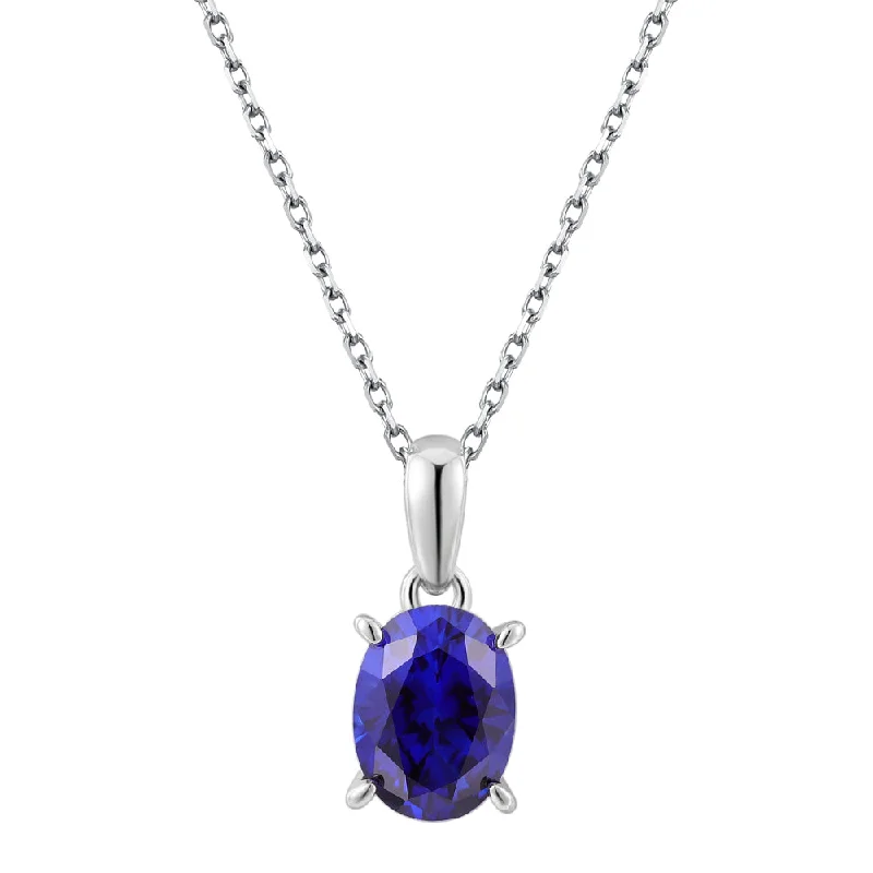 Affordable Glamour – Must-Have Jewelry At Special Rates Round Brilliant solitaire necklace with dark blue sapphire simulant in sterling silver